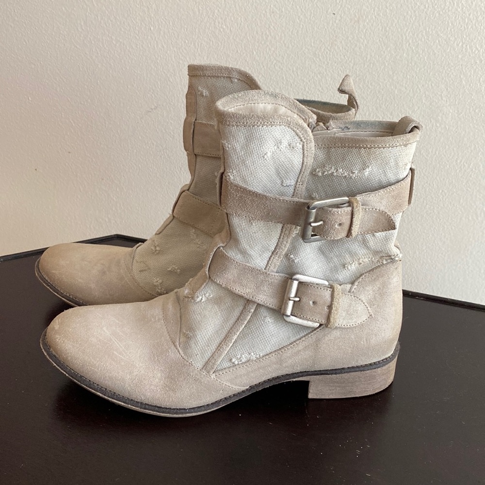 Boutique 9 boots. Cream color boots with buckles .